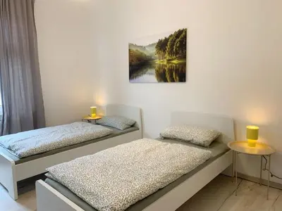Ein Bett oder Betten in einem Zimmer der Unterkunft Schöne Altbauwohnung in Wuppertal