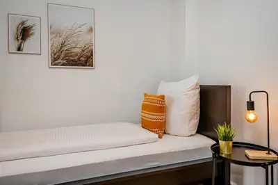 Ein Bett oder Betten in einem Zimmer der Unterkunft Gemütliche 2 Zimmerwohnung für 4 Personen