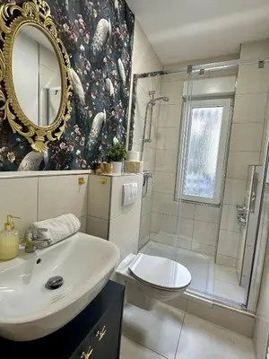 Ein Badezimmer in der Unterkunft Premium-Apartment im Duisburger Süden, nähe Düsseldorf Flughafen & Messe, Komplett ausgestattetes Apartment mit modernen Altbau-Flair