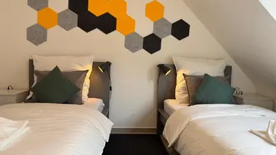 Ein Bett oder Betten in einem Zimmer der Unterkunft DUTTI'S HOME - Apartment A l 2 rooms l 4 Beds l TV l WIFI l Kitchen l Parking l Autobahn