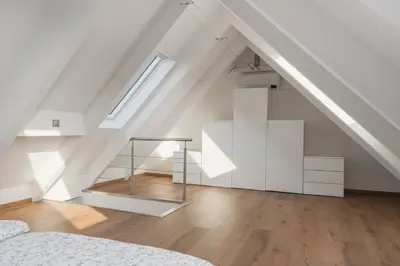 Ein Bett oder Betten in einem Zimmer der Unterkunft Panoramablick auf Baldeneysee