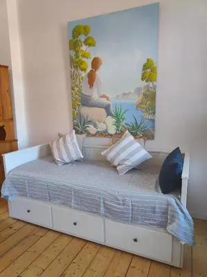 Ein Bett oder Betten in einem Zimmer der Unterkunft LöwenTAL an der Ruhr historisch im Grünen