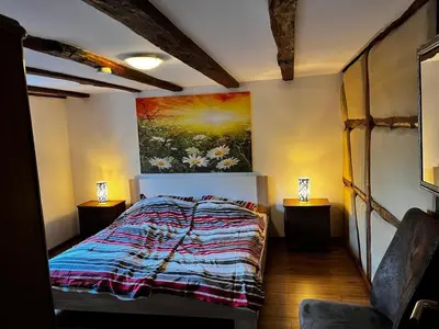 Ein Bett oder Betten in einem Zimmer der Unterkunft Kastanie im Neandertal