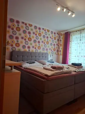 Ein Bett oder Betten in einem Zimmer der Unterkunft B&B Waldblick Hotel mit großem Parkplatz