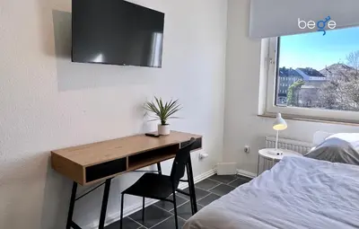 Ein Bett oder Betten in einem Zimmer der Unterkunft BEGE APARTMENTS Corporate Living
