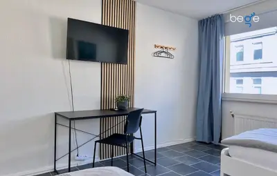 TV/Unterhaltungsangebot in der Unterkunft BEGE APARTMENTS Corporate Living