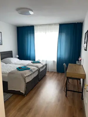 Ein Bett oder Betten in einem Zimmer der Unterkunft Apartment Nähe Messe Philharmonie, Rüttenscheid,Uniklinikum