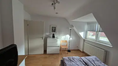Ein Bett oder Betten in einem Zimmer der Unterkunft Gemütliche Yoga-Wohnung, Ruhig, City & Stadionnähe