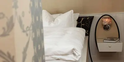 Ein Bett oder Betten in einem Zimmer der Unterkunft Landhaus Spatzenhof