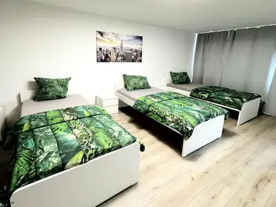 Ein Bett oder Betten in einem Zimmer der Unterkunft Work & Relax Apartments in Duisburg