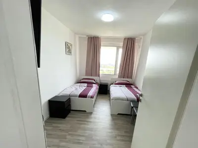 Ein Bett oder Betten in einem Zimmer der Unterkunft Work & Relax Apartments in Duisburg
