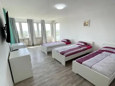 Ein Bett oder Betten in einem Zimmer der Unterkunft Work & Relax Apartments in Duisburg