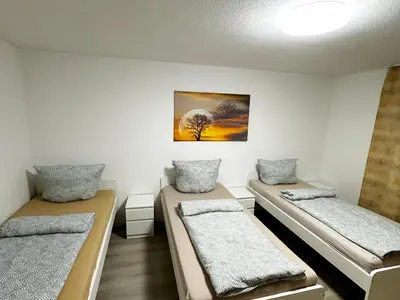 Ein Bett oder Betten in einem Zimmer der Unterkunft Work & Relax Apartments in Duisburg