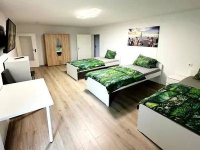 Ein Bett oder Betten in einem Zimmer der Unterkunft Work & Relax Apartments in Duisburg