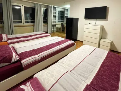 Ein Bett oder Betten in einem Zimmer der Unterkunft Workers Apartment Duisburg
