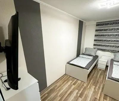 Ein Bett oder Betten in einem Zimmer der Unterkunft Workers Apartment Duisburg