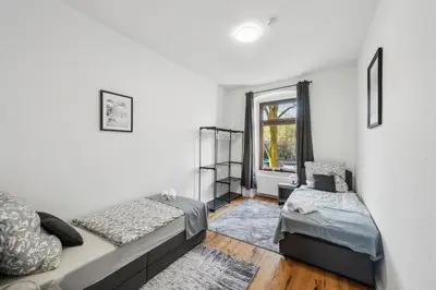 Ein Bett oder Betten in einem Zimmer der Unterkunft Wupper Home I, Top Lage Ideal für Geschäftsleute, Monteure, Familien, 3 Zimmer, Smart-TV