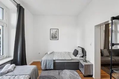 Ein Bett oder Betten in einem Zimmer der Unterkunft Wupper Home I, Top Lage Ideal für Geschäftsleute, Monteure, Familien, 3 Zimmer, Smart-TV