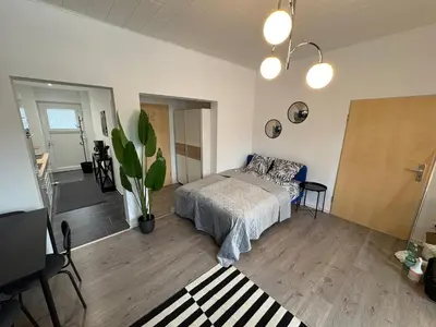 Ein Bett oder Betten in einem Zimmer der Unterkunft Kleines Zebra
