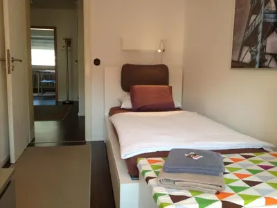 Ein Bett oder Betten in einem Zimmer der Unterkunft HertenFlats - Apartment Balkon