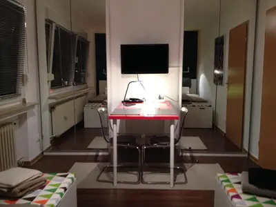 TV/Unterhaltungsangebot in der Unterkunft HertenFlats - Apartment Balkon