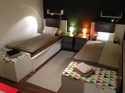Ein Bett oder Betten in einem Zimmer der Unterkunft HertenFlats - Apartment Balkon