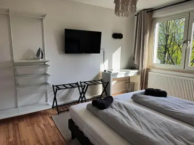 Ein Bett oder Betten in einem Zimmer der Unterkunft The green cow 6P apartment Balcony Smart TV