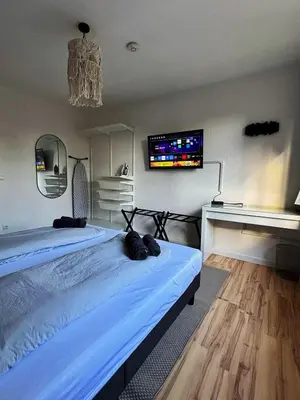Ein Bett oder Betten in einem Zimmer der Unterkunft The green cow 6P apartment Balcony Smart TV
