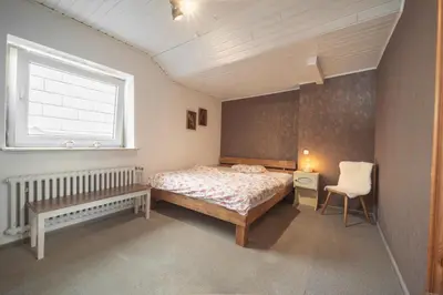 Ein Bett oder Betten in einem Zimmer der Unterkunft Im Herzen Kupferdrehs