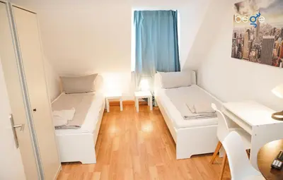 Ein Bett oder Betten in einem Zimmer der Unterkunft BEGE APARTMENTS Company Zone