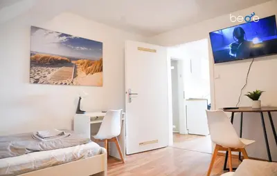 TV/Unterhaltungsangebot in der Unterkunft BEGE APARTMENTS Company Zone