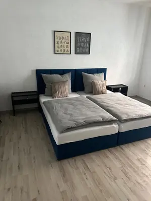 Ein Bett oder Betten in einem Zimmer der Unterkunft Smile Apartment 4
