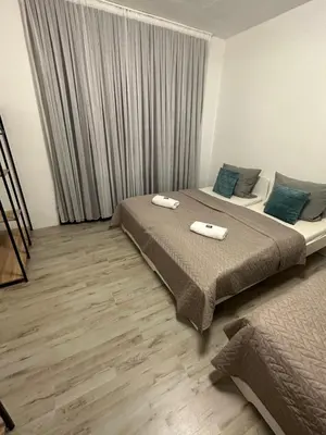 Ein Bett oder Betten in einem Zimmer der Unterkunft Smile Apartment 5