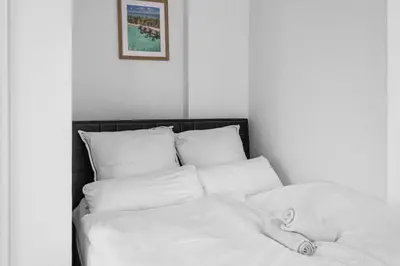 Ein Bett oder Betten in einem Zimmer der Unterkunft Stylisches City-Apartment