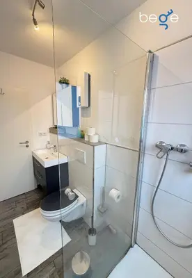 Ein Badezimmer in der Unterkunft BEGE APARTMENTS Company Spot