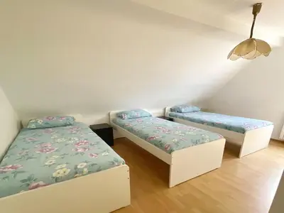 Ein Bett oder Betten in einem Zimmer der Unterkunft Cozy Apartment in Duisburg