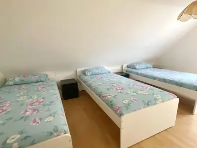 Ein Bett oder Betten in einem Zimmer der Unterkunft Cozy Apartment in Duisburg