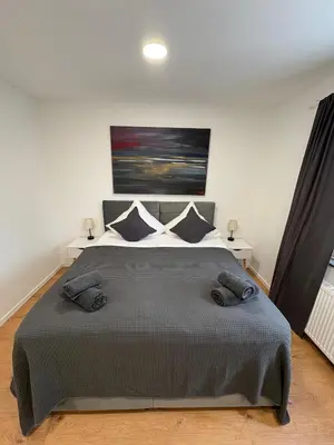 Ein Bett oder Betten in einem Zimmer der Unterkunft Ruehome