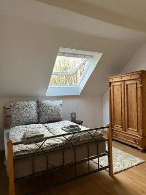 Ein Bett oder Betten in einem Zimmer der Unterkunft Glück Auf Appartement 35