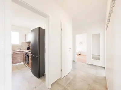 Ein Bett oder Betten in einem Zimmer der Unterkunft Tolstov Apartments - Monteurwohnung - 3 Schlafzimmer - Küche - Balkon - Waschmaschine