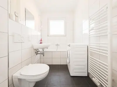 Ein Badezimmer in der Unterkunft Tolstov Apartments - Monteurwohnung - 3 Schlafzimmer - Küche - Balkon - Waschmaschine