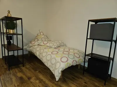 Ein Bett oder Betten in einem Zimmer der Unterkunft Ferienwohnung In den Birgden