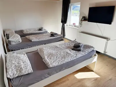 Ein Bett oder Betten in einem Zimmer der Unterkunft Wohnen auf Zeit in Hückeswagen -Neu-