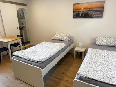 Ein Bett oder Betten in einem Zimmer der Unterkunft Wohnen auf Zeit in Hückeswagen -Neu-