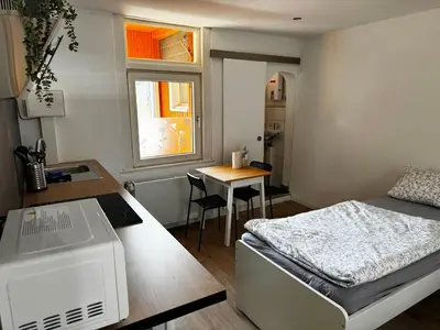 Ein Bett oder Betten in einem Zimmer der Unterkunft Wohnen auf Zeit in Hückeswagen -Neu-