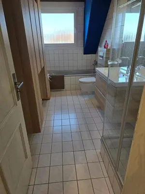 Ein Badezimmer in der Unterkunft Apartment Ergste am Ruhr 85 sqm , 3 minutes to A45 with Garage