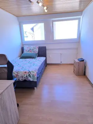 Ein Bett oder Betten in einem Zimmer der Unterkunft Apartment Ergste am Ruhr 85 sqm , 3 minutes to A45 with Garage