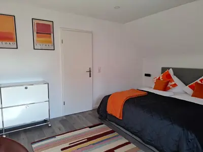 Ein Bett oder Betten in einem Zimmer der Unterkunft Zentral-Stilvoll-schöne Aussicht-Mediapaket-EN1