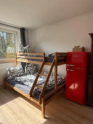 Ein Bett oder Betten in einem Zimmer der Unterkunft Urban Nest