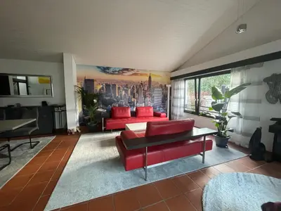 Ein Sitzbereich in der Unterkunft Charmantes Haus mit Gartenoase